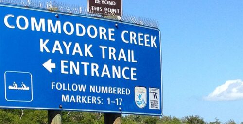 Image of the Commodore Creek Kayak Trail entrance sign at Tarpon Bay Explorers